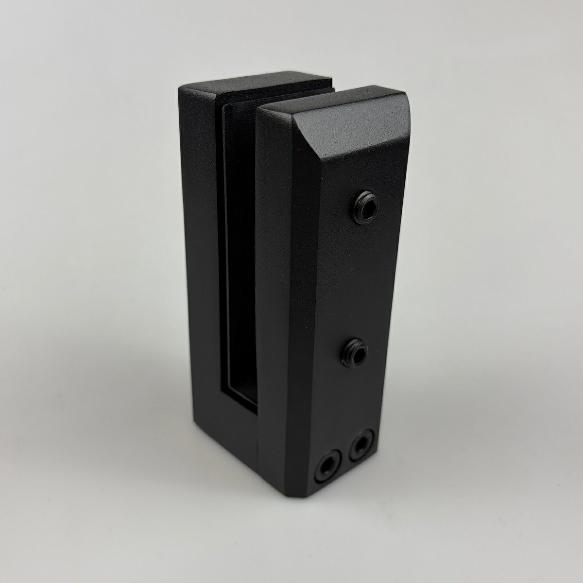 Side mount clamp for glass pool fences in matt black